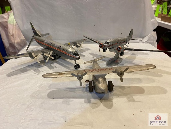 Die cast DC-3 American Airlines 11" x15", tin wind up Silver Eagle, and American Airlines battery op