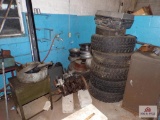 Lot of misc automotive parts to unclude wheels, tires, engine parts, storage cabinets, etc