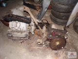 Lot of automotive parts to include engine, transmission, etc