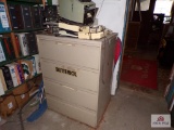 Latteral file cabinet with various electronics and contents