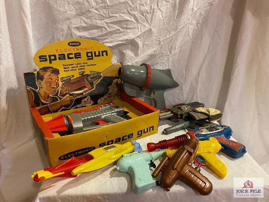 Lot of vintage space-related guns