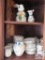 Lenox dishes, bunny cookie jar and cow creamer in cabinet