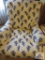 Pair of upholstered lion motif arm chairs