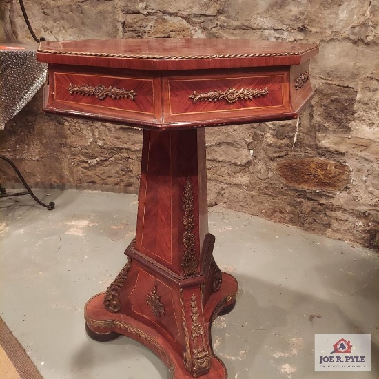 Octagon pedestal table with gilded bronze