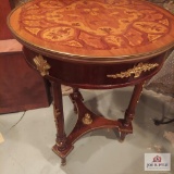 Inlayed wood and gilded bronze side table 22 in diameter 30in tall