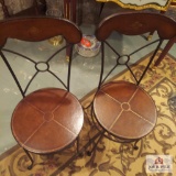 2 Wood and wrought iron bistro style chairs