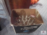 box of glassware with candle holders