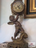 Cupid Clock brass
