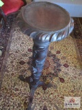Vintage wooden pedestal with grape vine motif