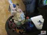 Misc. decorative figurines with Ritz ashtray