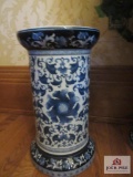 Decorative pedestals with silk flower arrangements