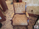 Upholstered rocker with rollers