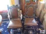 Two wooden chairs with upholstered seat