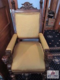 Vintage wooden chair with gold color upholstery