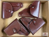 [737] Four leather flap holsters (brown)