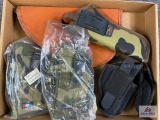 [739] Five nylon holsters + pistol case