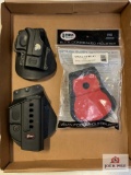 [288] Three Fobus paddle holsters