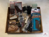 [410] Large Lot of grips and grip panels: Colt, SILE, Taurus, Etc.