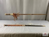 [361] Decorative Sword with leather fringe and basketweave motif