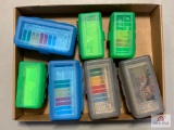 [418] Seven empty ammo containers