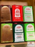 [423] Six smokeless powder containers