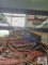 Assortment of extension cords on wire shelf
