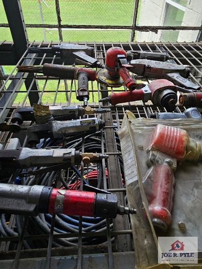 Misc. air power tools on wire shelf