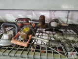 Misc. electric power tools on wire shelf