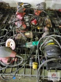 Misc. electric power tools on wire shelf