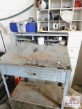 Grey shelf and contents
