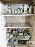 tan metal cabinet and contents