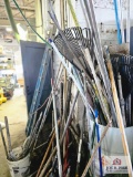 Barrel of hand tools & ladder & buckets of misc.