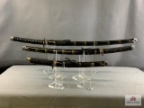 [94] Three Decorative Oriental Samurai Type Swords w/Stand