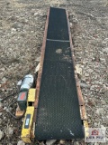 conveyor with electric motor