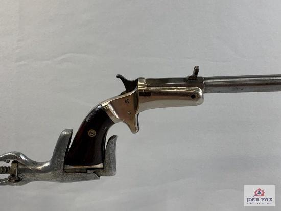 [85] J. Stevens Tip Up Model Pistol .22 cal, SN: 1757