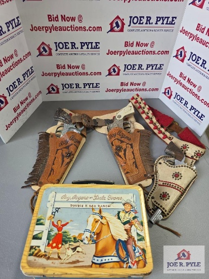 3 Roy Rogers cap guns and a lunch box