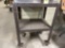 Steel table w/shelf; 25 in. x 18 in. x 38 in. tall; w/casters