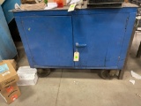 Blue metal cabinet on casters w/ tool box