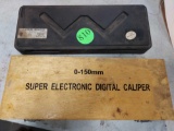 pair of dial calipers