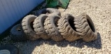 SKID LOADER TIRES 12-16.5  4 WITH RIMS