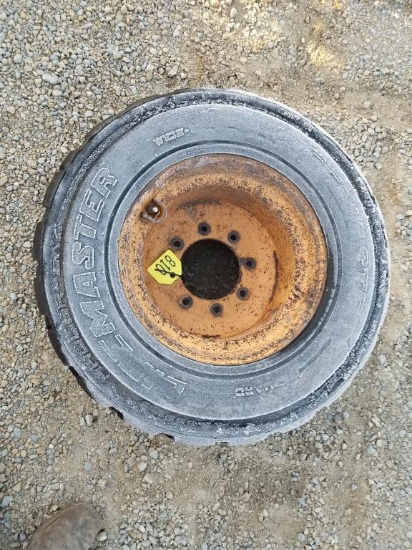 Case 33x15.5-16.5 Tire and Rim