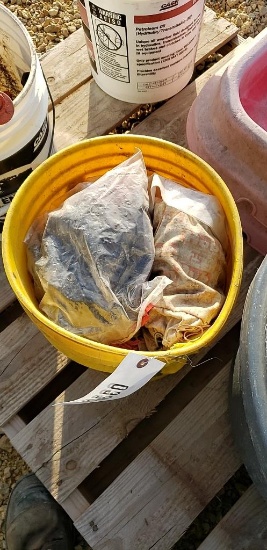 BUCKET OF FENCE INSOLATORS