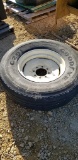 315/80R 22.5 TIRE ON 8 BOLT RIM