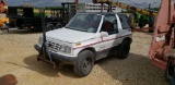 1991 GEO TRACKER, 4 X 4, RUNS & DRIVES- 5 SPD