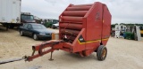 OMC 595 ROUND BALER- WORKS GOOD