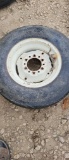 6 X 15 IMPLEMENT RIM WITH TIRE