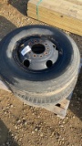 PAIR OF 9.00-20 TIRES ON RIMS