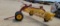 NEW HOLLAND 258 ROLLABAR RAKE WITH DOLLY
