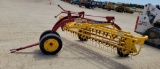 NEW HOLLAND 258 ROLLABAR RAKE WITH DOLLY