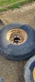 11.00 X 16 FRONT TRACTOR TIRE ON 8-BOLT RIM